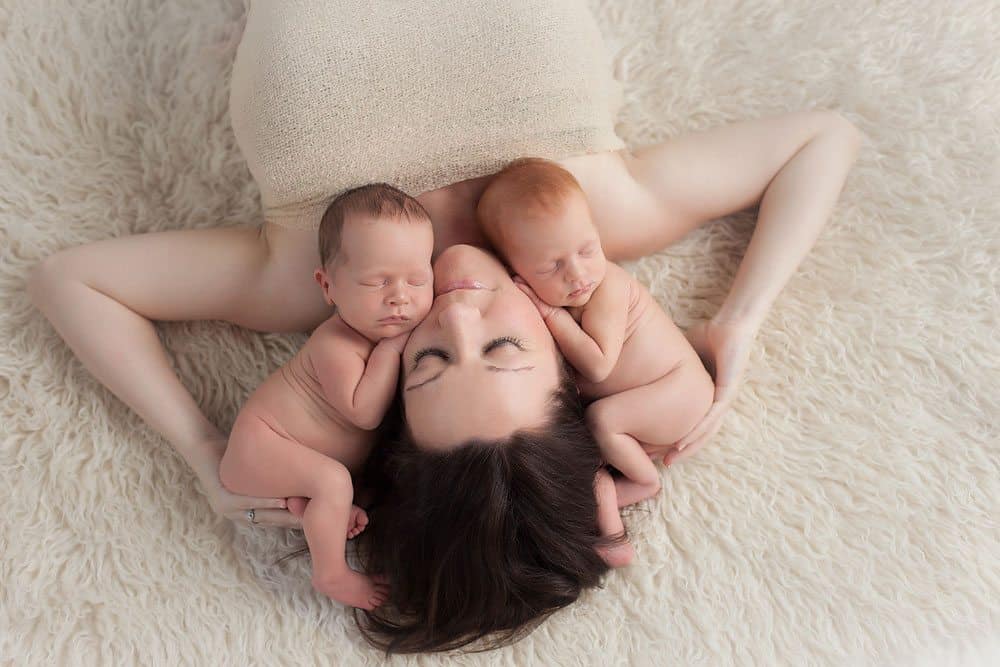 newborn twins with mommy light calm pose