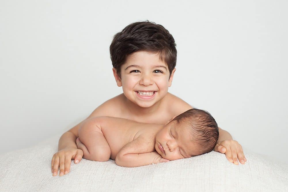 newborn picture with sibling brother