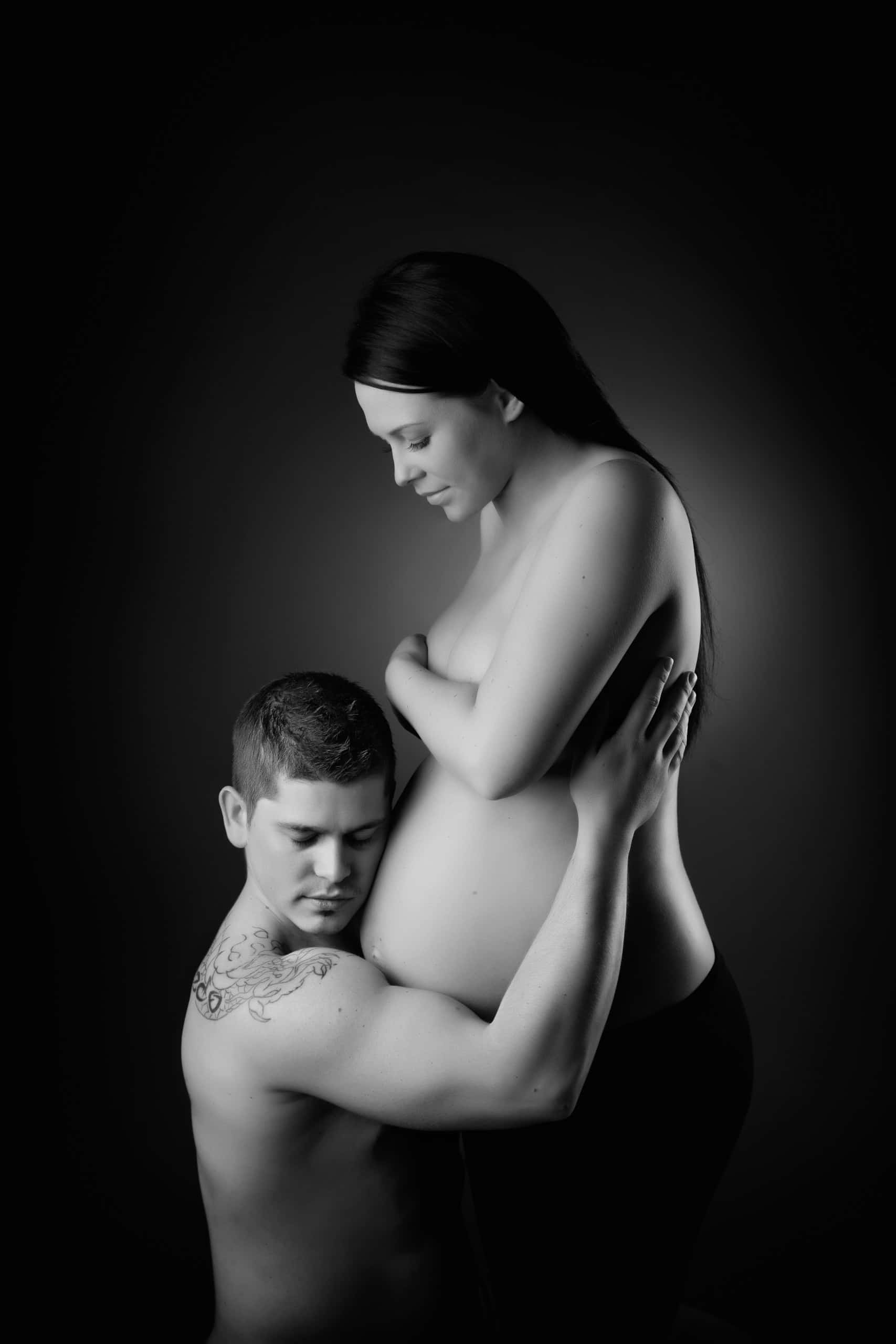 couples black and white maternity photo in Edinburgh studio
