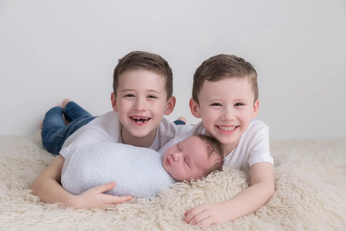 Newborn with siblings photos
