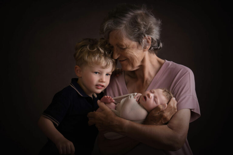 grandmother with grandchildren portrait by edinburgh newborn photographer